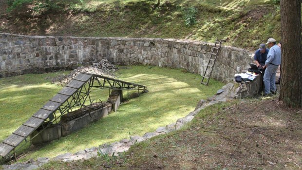 Jewish forced laborers dug a tunnel from this holding pit near Vilnius, Lithuania, into the surrounding forest.