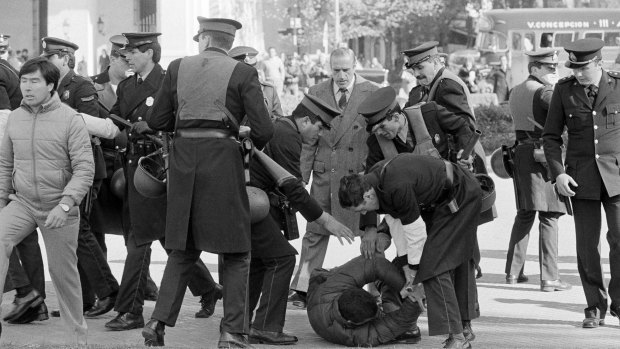 Is this war?: Police wrestle a protester to the ground in the Plaza de Mayo in Buenos Aires on June 15, 1982. Bill O'Reilly says he covered the Falklands War, but other journalists have questioned his account.