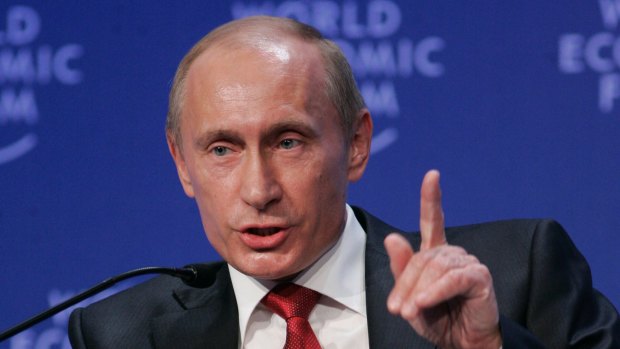 Strong ties: Russian President Vladimir Putin speaking to business leaders at the World Economic Forum during the global financial crisis
