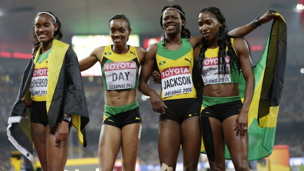 Jamaica's Stephenie Ann McPherson, Christine Day, Shericka Jackson and Novlene Williams-Mills after winning the women's 4x400 relay.
