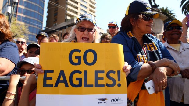 West Coast fans show their support during the grand final parade.