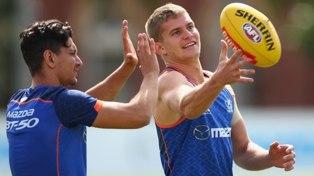 The Kangaroos' Jed Anderson, pictured with Robbie Nahas, is set to return from injury with Werribee this weekend. 