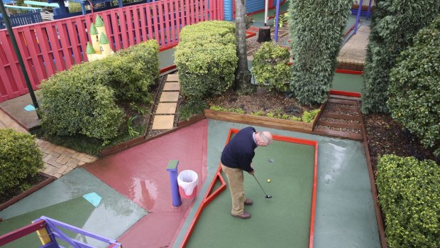 Tony Smith plays at the Ermington Putt Putt centre, which is under
threat from a development proposal for 1000 units.