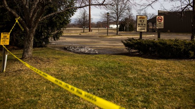 Police tape is seen outside a Cracker Barrel restaurant in Kalamazoo, Michigan on Sunday.