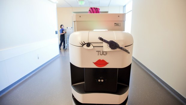 TUG, a robot courier, carries supplies at  the UCSF Medical Centre in California.