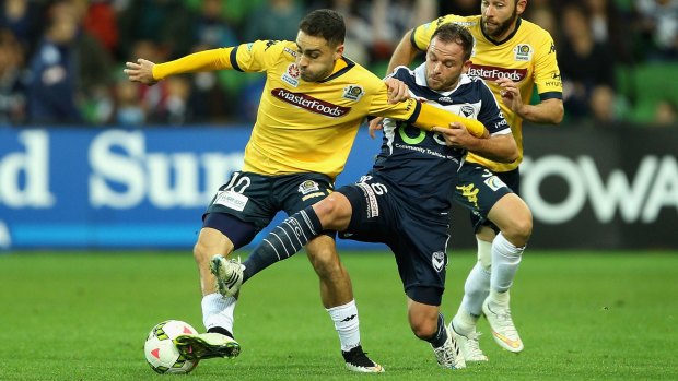 On the move: Anthony Caceres (left) is keen to obtain a release from the Central Coast Mariners and has attracted overseas interest.