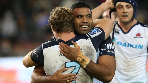 Relieved: Waratahs players celebrate winning the Super Rugby match against the Stormers and Waratahs at Cape Town.