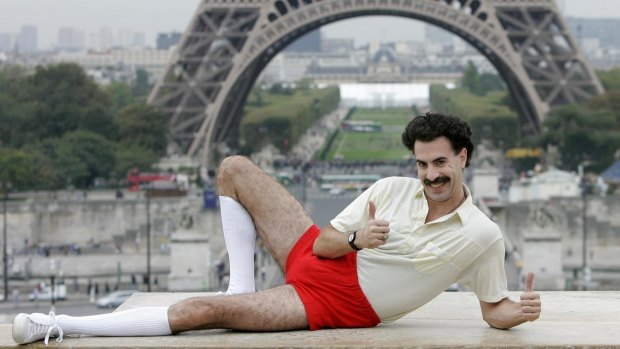 British actor Sacha Baron Cohen, dressed as "Borat" poses for the press near the Eiffel tower in Paris.