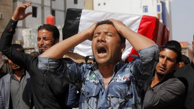 Mourners at the funeral of a Shi'ite fighter killed in clashes with Islamic State militants in Salahuddin province, Iraq. 