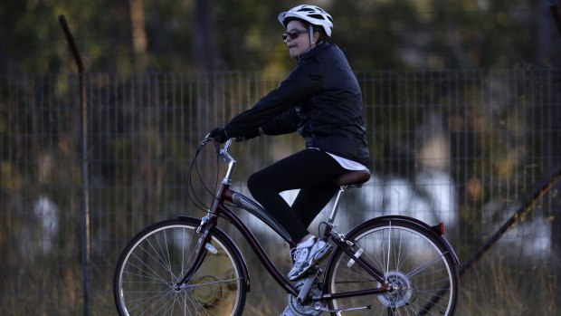 Brazilian President Dilma Rousseff rides her bicycle near the Alvorada Palace in Brasilia last week.