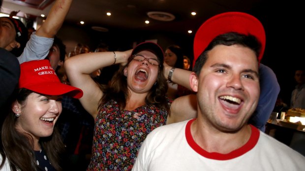 Donald Trump fans cheer at the United States Studies Centre at the University of Sydney.