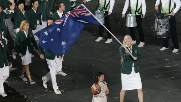 The Australian Olympic team enter the stadium led by flag-bearer Lauren Jackson at the London Olympics opening ceremony in 2012.