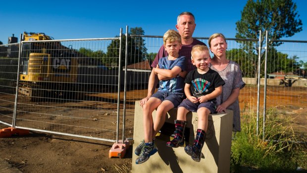 Anthony Steve, and Clare Steve with their kids Alexander Steve (7) and Oliver Steve (3) paid $1.6 million for a Mr Fluffy block however asbestos has been found on the land. 