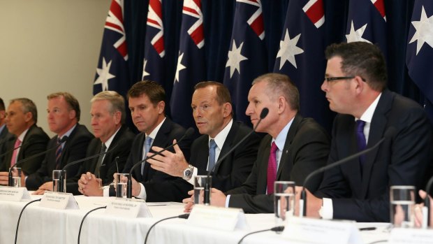 Forgotten agenda: Tony Abbott with state and territory first ministers at the leaders' retreat in July.
