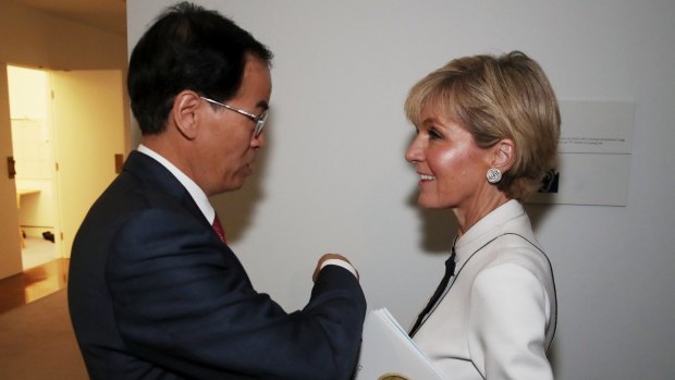 Foreign Minister Julie Bishop with Chinese ambassador Cheng Jingye. Former ambassador Geoff Raby says China policymaking has been shifted from the Department of Foreign Affairs.