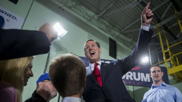 Rick Santorum gestures after announcing he will seek the Republican presidential nomination.