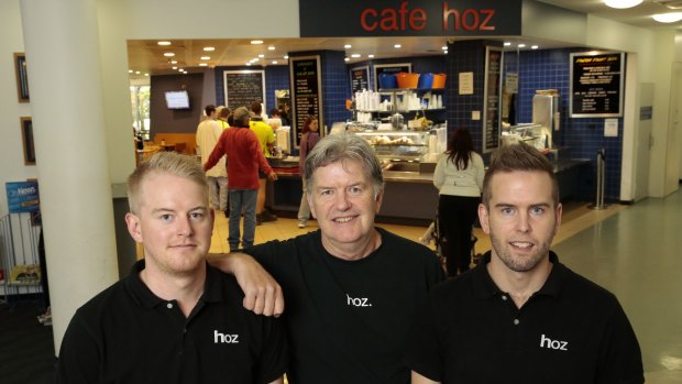 Cafe Hoz owner Richard Butler, centre, with sons Charlie Butler, left, and Henry Butler, right, who finish up a "terrific" 20 years of operating the cafe at Canberra Hospital on May 1 after losing the tender.