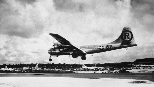 The Enola Gay lands at Tinian, Northern Mariana Islands after its bombing mission at Hiroshima. 