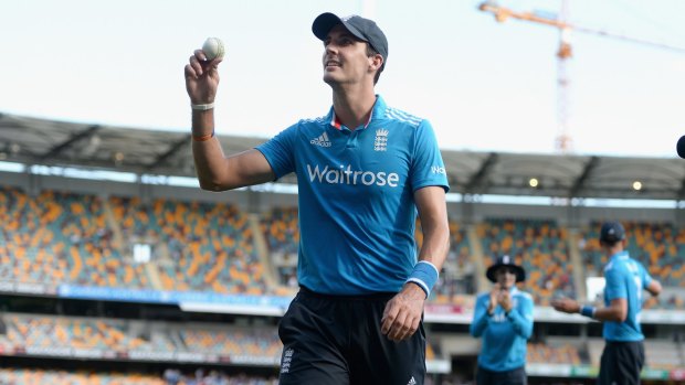 Man of the match Steven Finn leads the England team in after India was dismissed for 153.