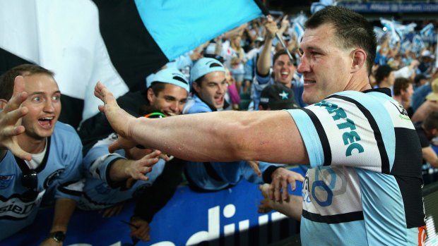 Rejoicing: Paul Gallen celebrates with fans after winning the final over the South Sydney Rabbitohs at Allianz Stadium.
