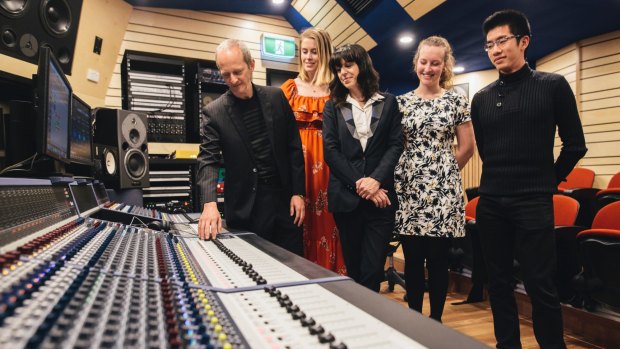 ANU School of music's Ken Lampl and Samantha Bennett with students Amy Jenkins (second from left) Jacqui Douglas (second from right) and Aaron Chew (right) at the opening of the new recording studio at the school.