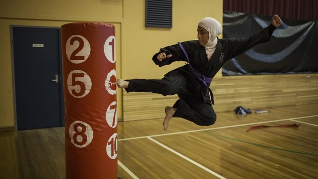 17-year-old Saleha Amin from South Granville High taking part in a tae kwon do practice run by Master Ridvan in Auburn. 