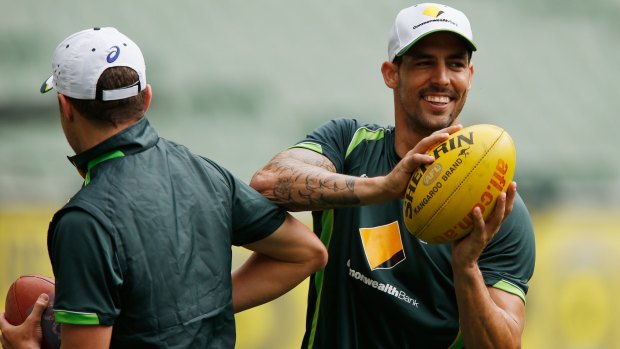 Peter Siddle and Mitchell Johnson enjoy an Australian training session at the MCG on Tuesday.