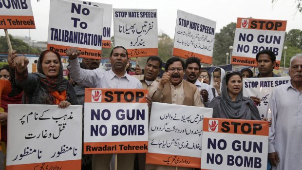 Pakistani civil society activists condemn Sunday's suicide bombing in a park in Lahore.