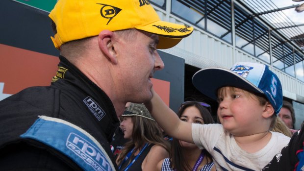 Winterbottom with his son, Austin, after the race.