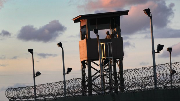 A military guard tower stands on the perimeter of a detainee camp at the US detention centre for 'enemy combatants' in Guantanamo Bay in 2010. 