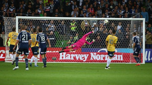 Mariners goalkeeper Liam Reddy is beaten by a shot from Gui Finkler of the Victory (not in picture).