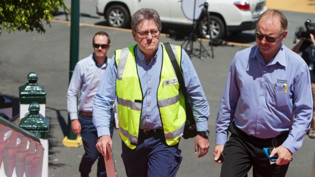 Saftey officers arrive to inspect the ride at Dreamworld on Wednesday.