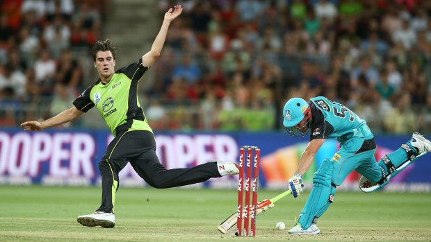 All-rounder: Pat Cummins attempts a runout while playing for the Sydney Thunder. 