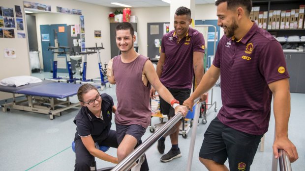 Marshall, pictured with Pangai and Kahu, has been undergoing daily therapies including physio since losing his arm in the car accident.