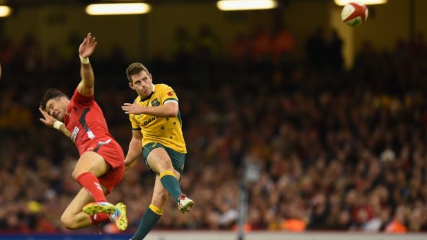 Cool head: Bernard Foley kicks the field goal against Wales.