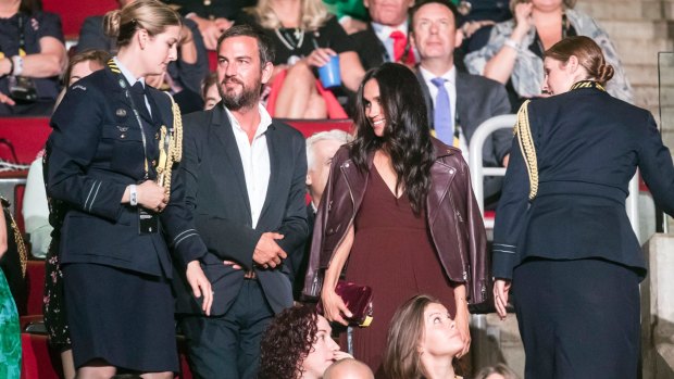 Meghan Markle and Markus Anderson, centre, at the opening ceremony of the Invictus Games in Toronto.