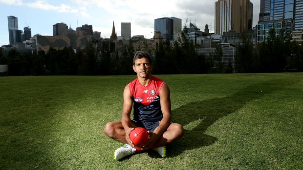  Melbourne footballer Neville has signed a new contract with the club. 