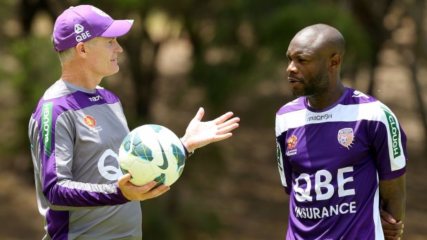 Purple stint: Alistair Edwards during his time as Perth Glory coach, with William Gallas at training.