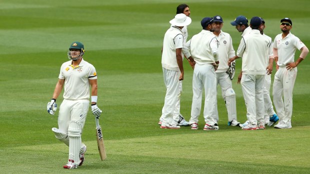 On his way: Shane Watson leaves the field after being dismissed by Ishant Sharma at the Melbourne Cricket Ground.