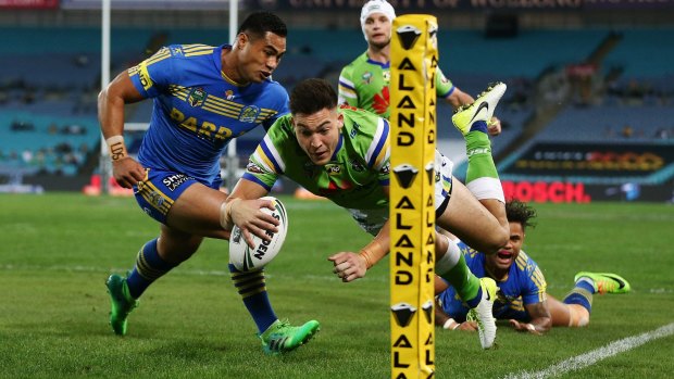 SYDNEY, AUSTRALIA - MAY 20: Nikola Cotric of the Raiders dives to score a try during the round 11 NRL match between the Parramatta Eels and the Canberra Raiders at ANZ Stadium on May 20, 2017 in Sydney, Australia. (Photo by Brendon Thorne/Getty Images)