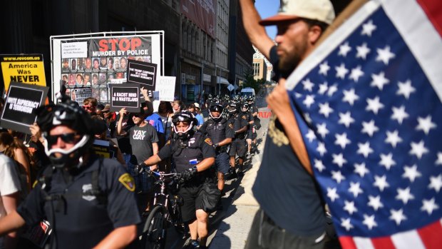 Protestors march through downtown Cleveland on the second day of the RNC.