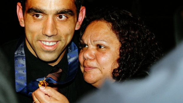 Goodes with his 2003 Brownlow Medal with his mother Lisa May at Crown Palladium in Melbourne. 