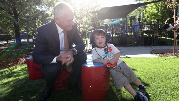 Prime Minister Malcolm Turnbull with Isaac at a childcare centre in Canberra in February. 
