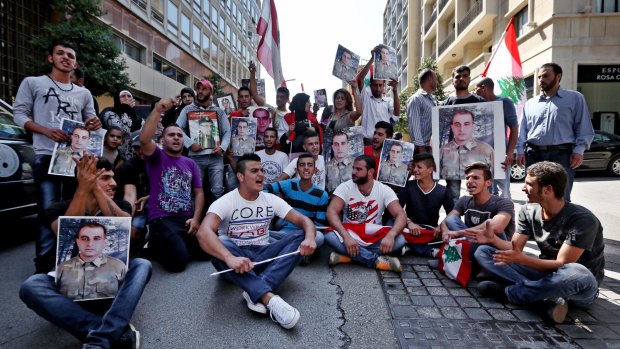 Families of missing Lebanese soldiers Saif Thebian and Mohammed Hussein Yousufwho who were kidnapped by Islamic State militants and the Al-Nusra Front, protest for their release in Beirut, Lebanon. 