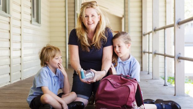 Diagnosis overdue: Rowena Flack with her children Saxon, 6, and Tara, 9, who both suffer from asthma. 