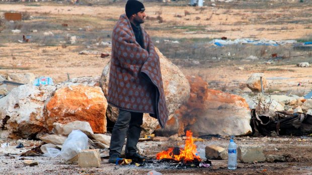 Temperatures in Syria are dropping below zero as thousands seek refuge from the besieged city.
