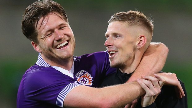 Alex Grant of the Glory (left) and Andy Keogh celebrates the win.