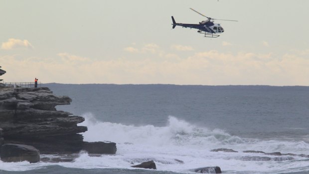 Police and lifesavers led a search for the man missing off Bondi Beach