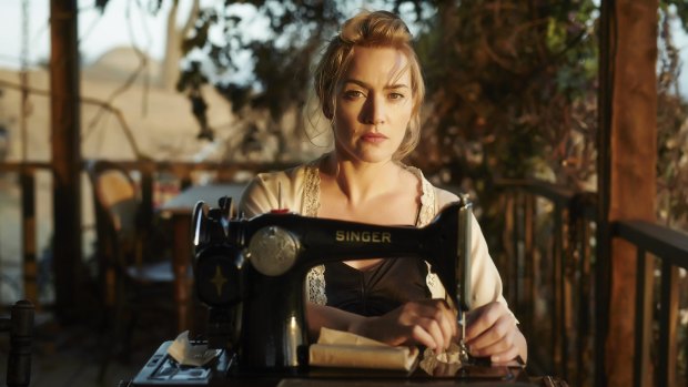 Tilly Dunnage (Kate Winslet) brandishes her Singer sewing machine like a lethal weapon in The Dressmaker. Producer Sue Maslin struggled to get funding for the box office smash without an A-list male