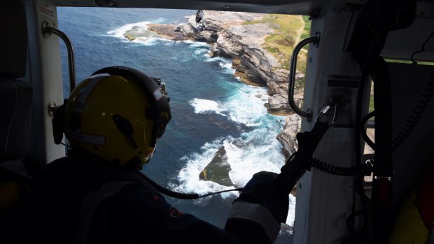 The surf rescue helicopter is often busiest on days when the ocean is deceptively calm.